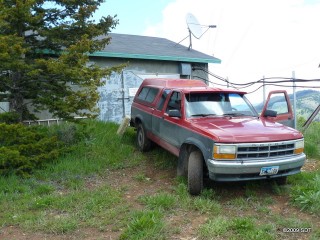 Reid truck in front of shack